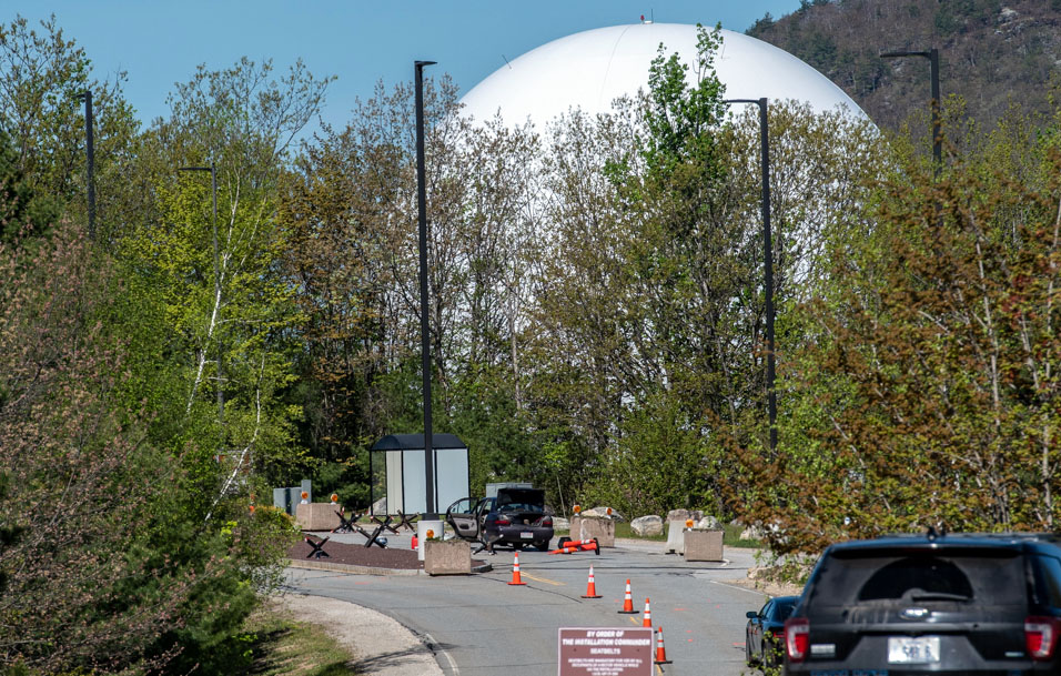 Officials identify officer and security contractor involved in fatal